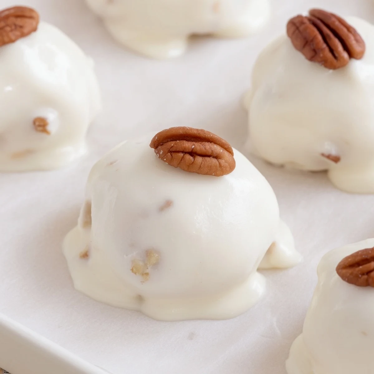 Look at the photo of classic Divinity candy—snowy white mounds with pecan pieces.
